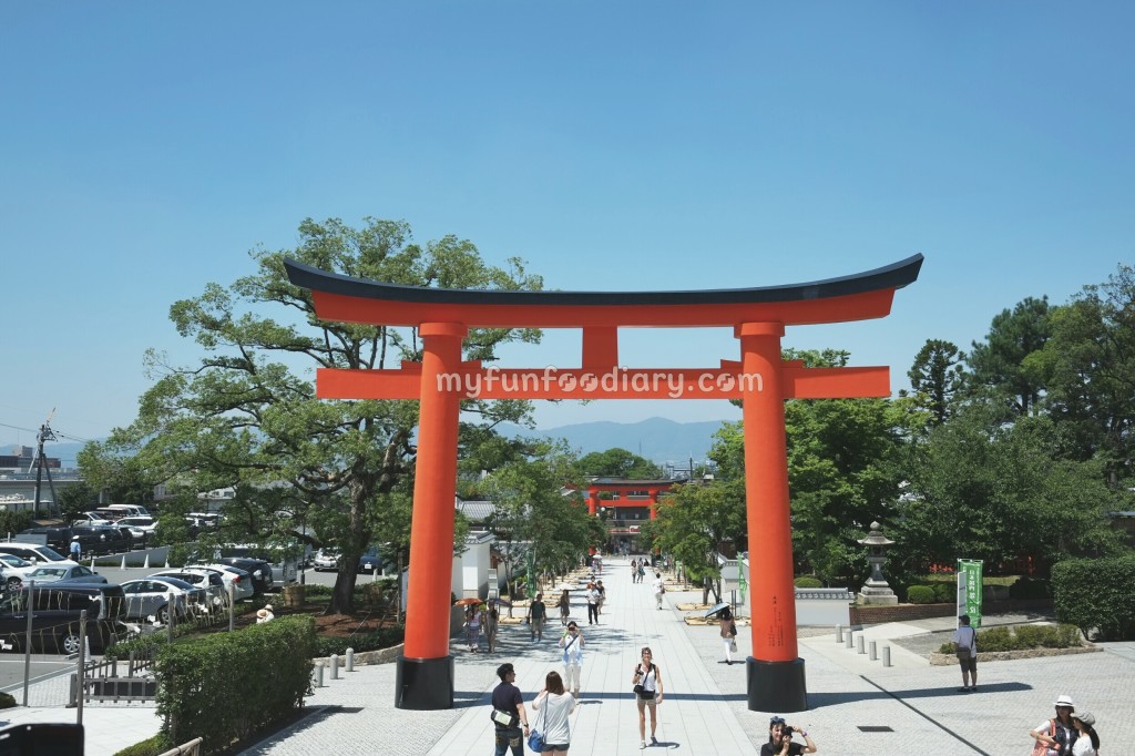 The Giant Torii Gate in front of the Romon Gate at Fushimi Inari Taisha by Myfunfoodiary