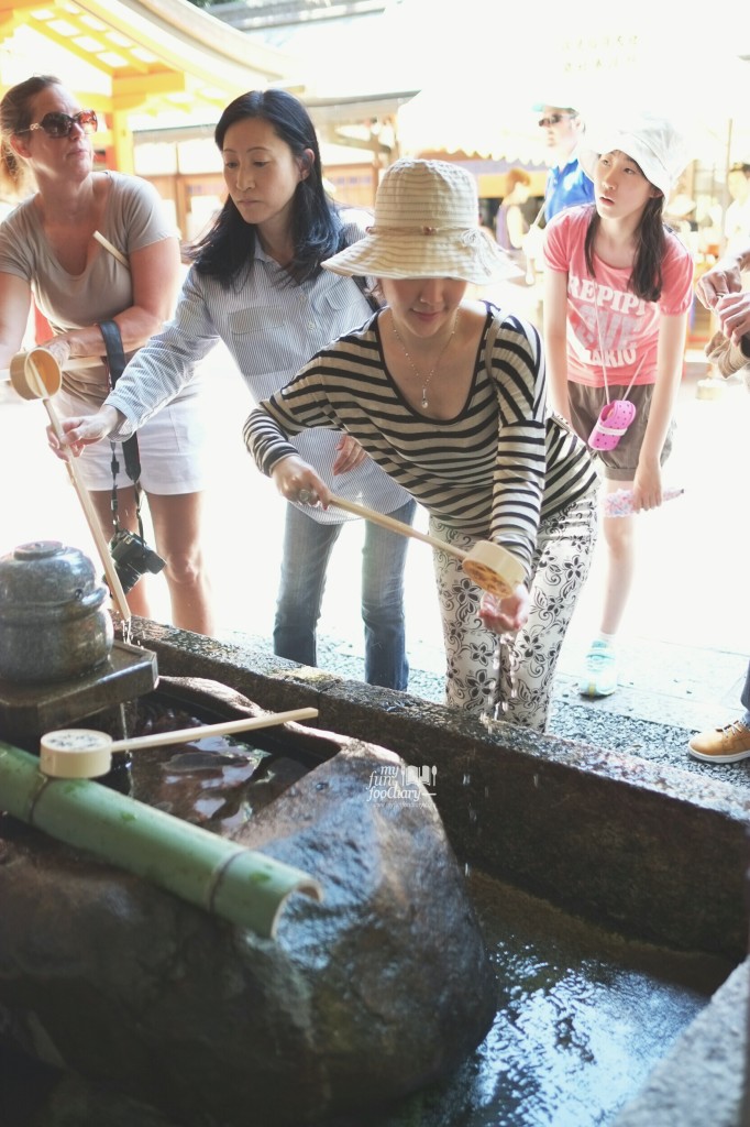 Drinking the water at Fushimi Inari Taisha by Myfunfoodiary
