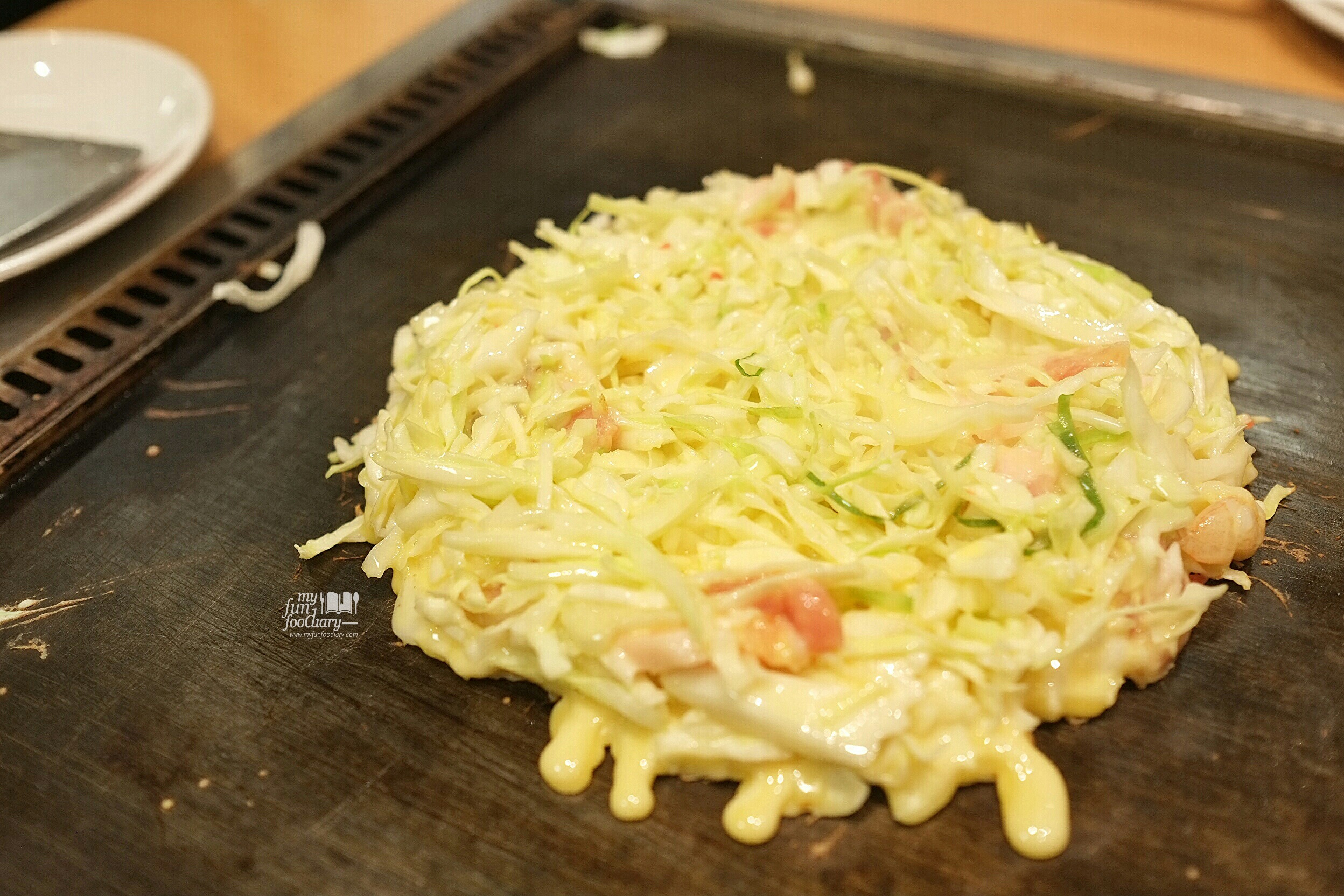 First Step In the Making of Okonomiyaki at Tsuruhashi Fugetsu Dotonbori Osaka by Myfunfoodiary