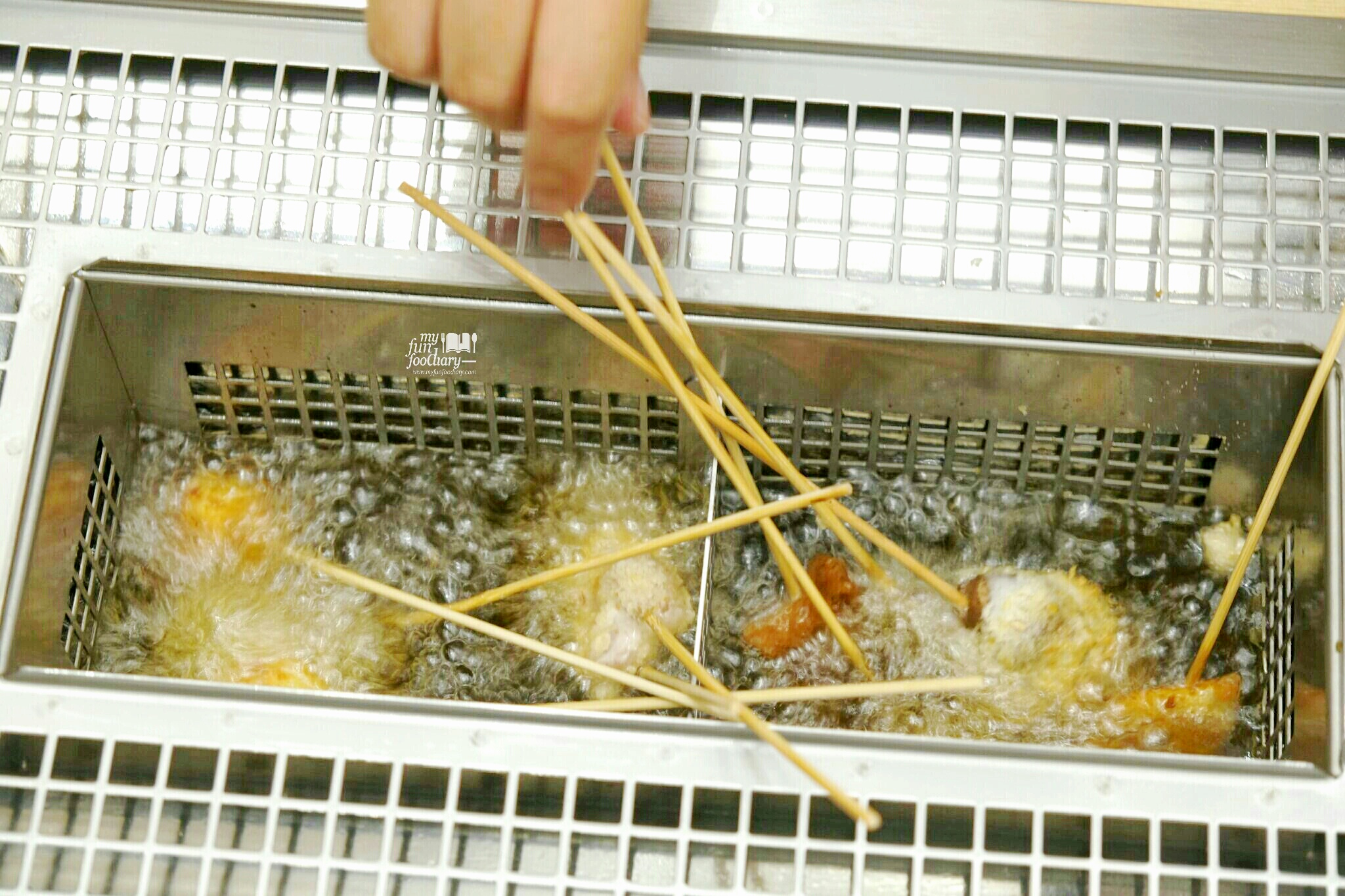 Cooking process at Kushiya Monogatari by Myfunfoodiary